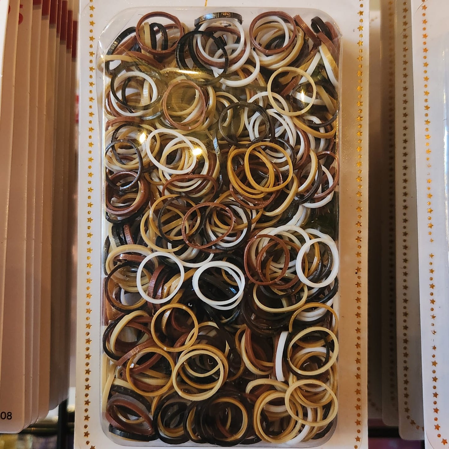 500 Multicolored Elastics (White, Clear, Brown, Black)